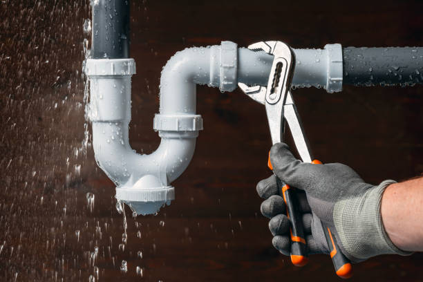 Professional Drain Cleaning technician working in Norton, MA